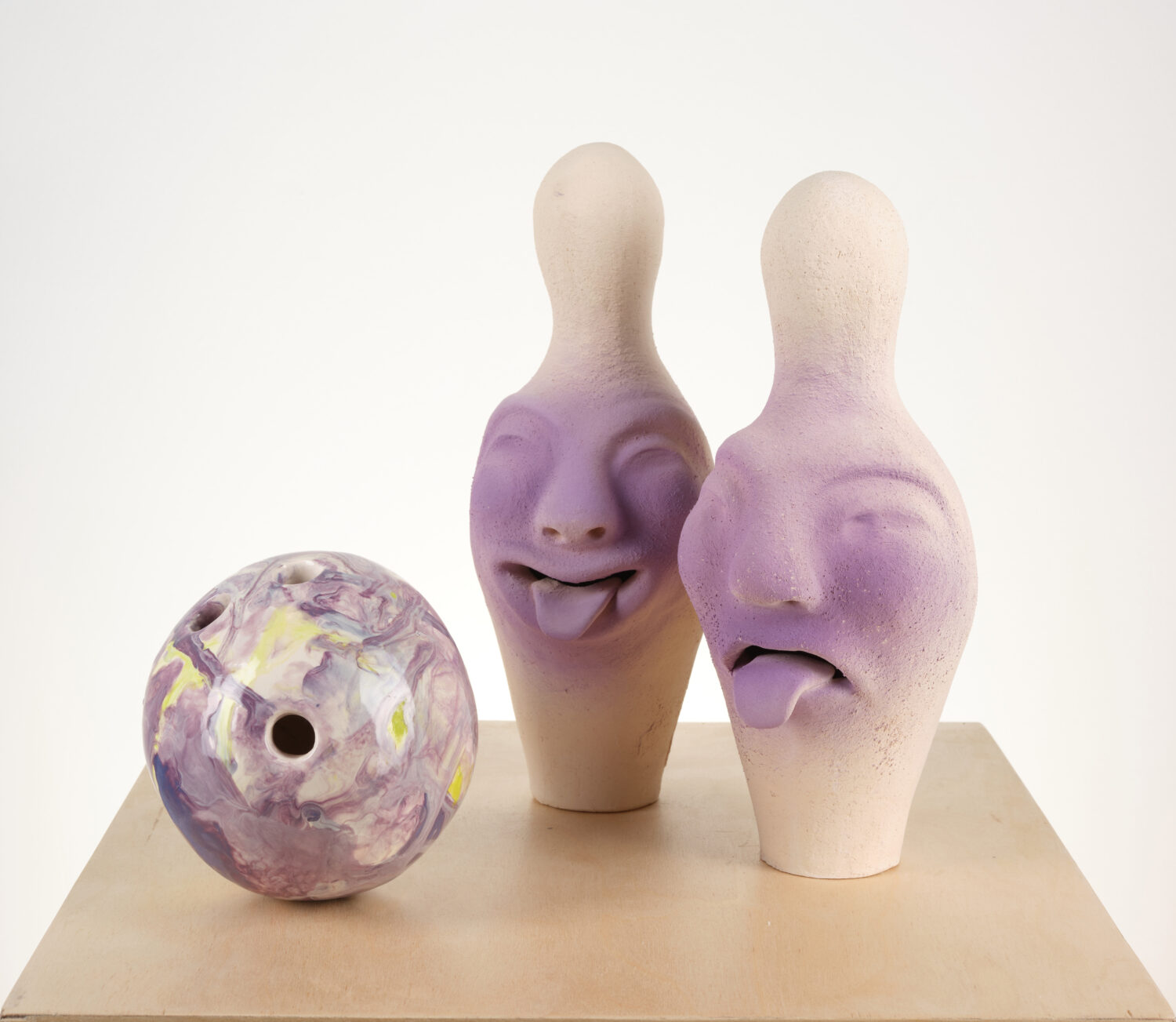 Maral Taşkırıcı, Playing The Long Game, 2024, Underglaze painted stoneware -pins- and glazed ceramic -ball-, 29 x 12 x 12 cm, 12 cm