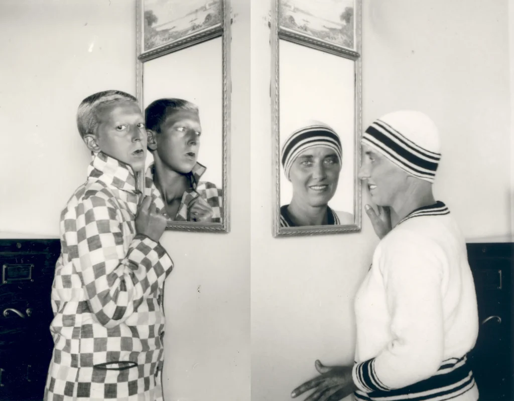 Marcel Moore, No Title [Claude Cahun reflected in the mirror, checked jacket], 1928 Monochrome print - Claude Cahun, No Title [Marcel Moore reflected in the mirror], 1928 Monochrome print