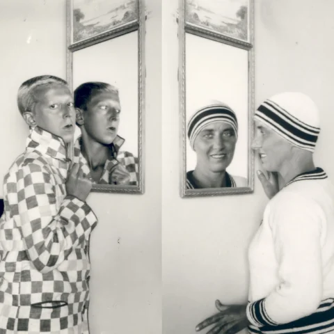 Marcel Moore, No Title [Claude Cahun reflected in the mirror, checked jacket], 1928 Monochrome print - Claude Cahun, No Title [Marcel Moore reflected in the mirror], 1928 Monochrome print