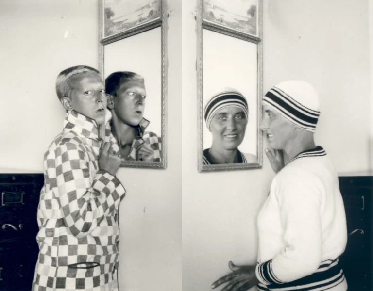 Marcel Moore, No Title [Claude Cahun reflected in the mirror, checked jacket], 1928 Monochrome print - Claude Cahun, No Title [Marcel Moore reflected in the mirror], 1928 Monochrome print